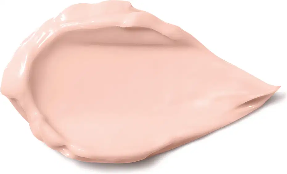 Substância cremosa de cor nude rosada, com textura brilhante e aparência sedosa de creme acetinado hidratante corporal Lily Gardênia.