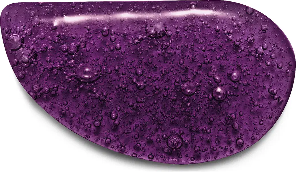 Textura roxa brilhante com bolhinhas, com superfície irregular e aspecto úmido, sugerindo se tratar do sabonete líquido da marca Nativa SPA Uva Merlot.