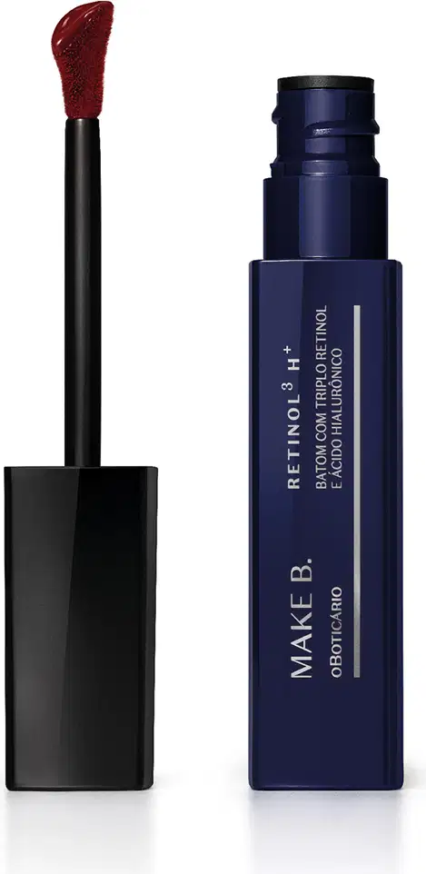 Frasco de batom líquido da marca Make B. com aplicador em formato de pincel com ponta aveludado na cor do produto, em embalagem azul escura com texto em branco.