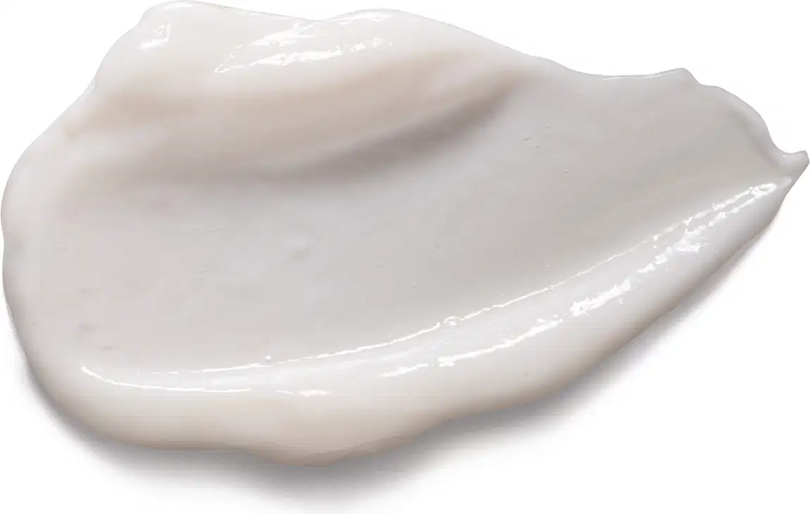Imagem da textura cremosa e brilhante de condicionador Match Nutrição Regeneradora, com superfície lisa e uniforme. Possui cor branca e translúcida.