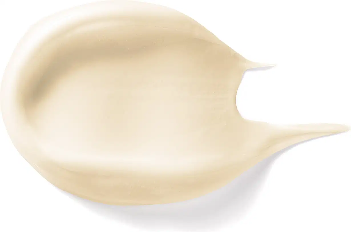 Imagem da textura cremosa e brilhante e cor branca do creme acetinado corporal da marca Lily espalhado com superfície lisa e uniforme.