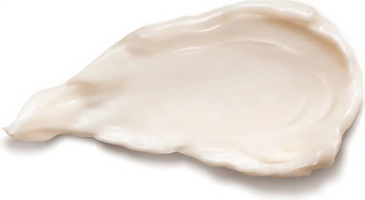 A textura do óleo em creme Nativa SPA Rosas Secretas apresenta uma aparência cremosa e aveludada, com uma consistência suave e sedosa. Sua cor predominante é um tom bege claro, com um brilho sutil.