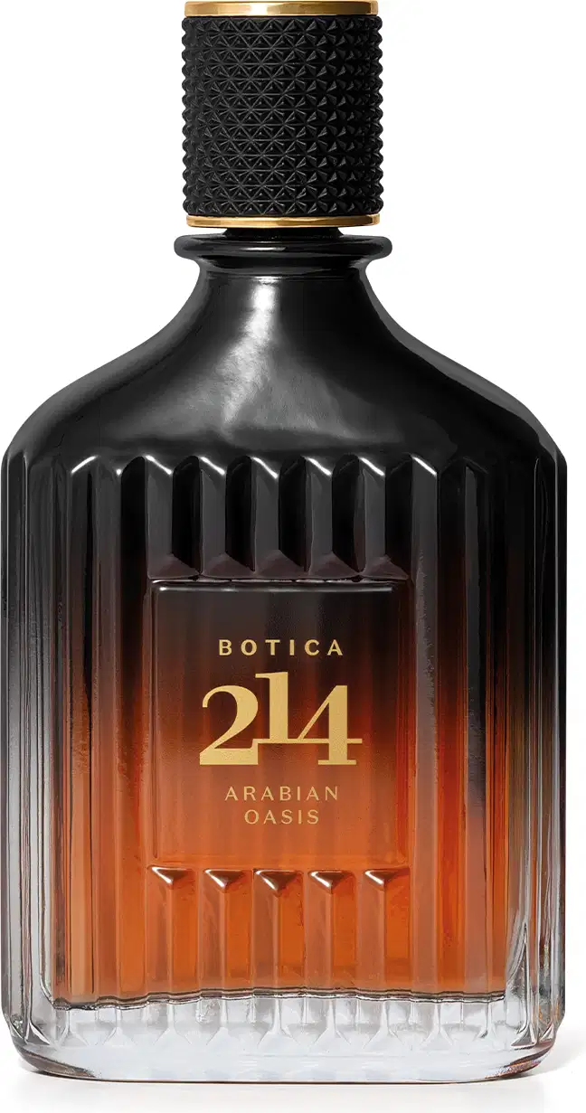 Frasco de perfume Botica 214 Arabian Oasis, com design de vidro facetado em tons de laranja e preto, com tampa dourada e rótulo destacando o nome da fragrância.