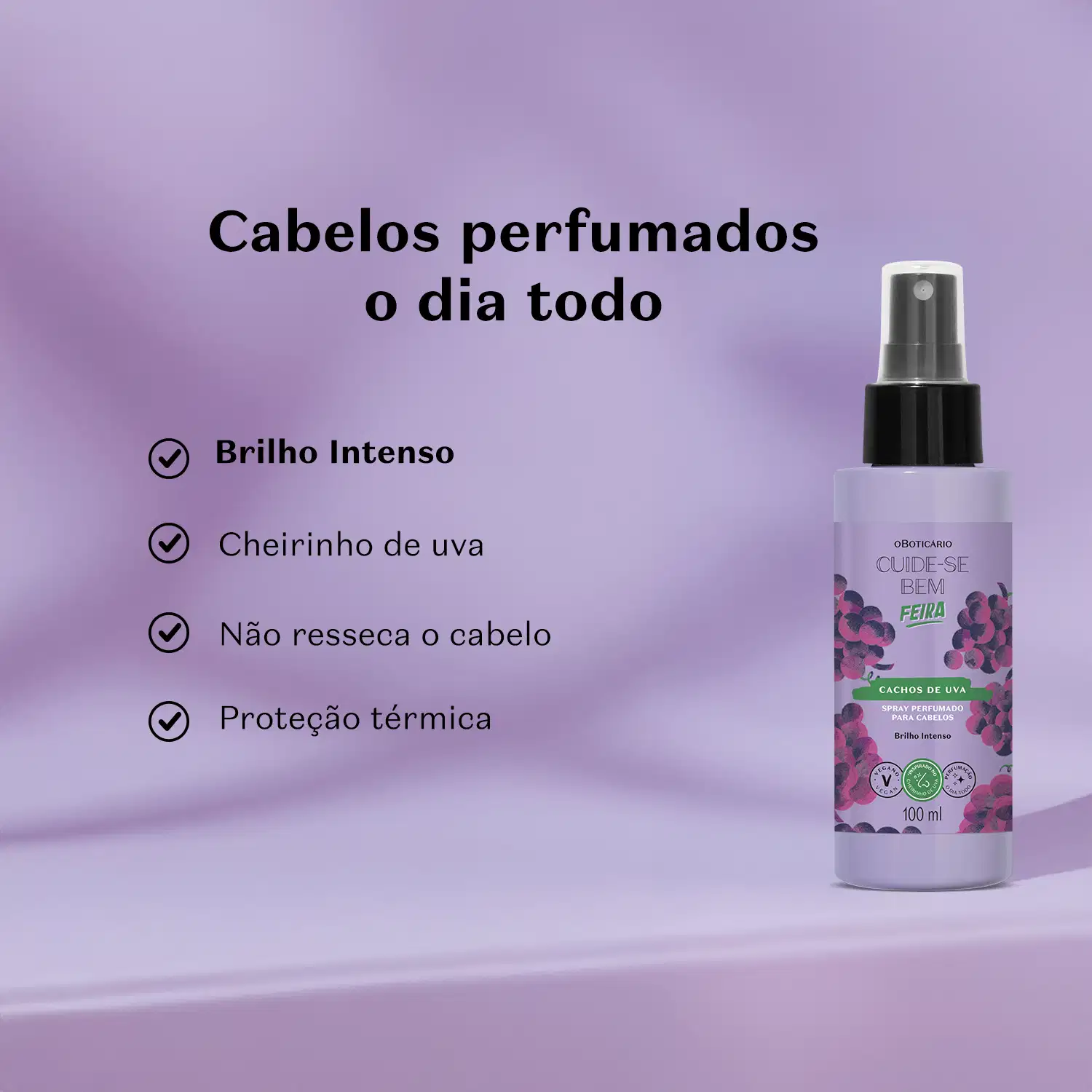 Frasco de spray perfumado para cabelos da marca Cuide-se bem Feira Cachos de Uva, em fundo roxo, com texto descrevendo seus benefícios, como brilho intenso, cheiro de uva e proteção térmica.