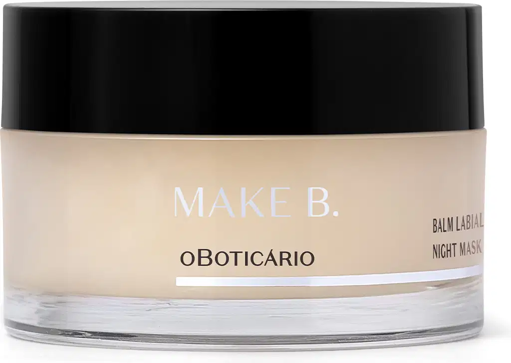 Pote de balm labial noturno da marca Make B. Lip Chronology Night Mask. O recipiente é redondo, com uma tampa preta e o rótulo exibe o nome da marca em letras brancas. Há detalhes branco na embalagem.