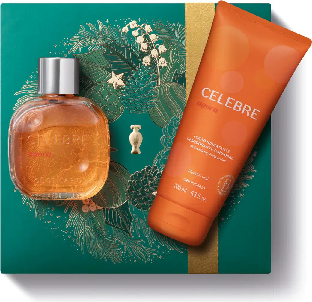 Imagem do Kit Presente Natal Celebre Agora com um vidro redondo com líquido laranja e tampa dourada de desodorante colônia e uma bisnaga laranja de loção hidratante corporal sobre uma caixa verde presenteável com estampa natalina.