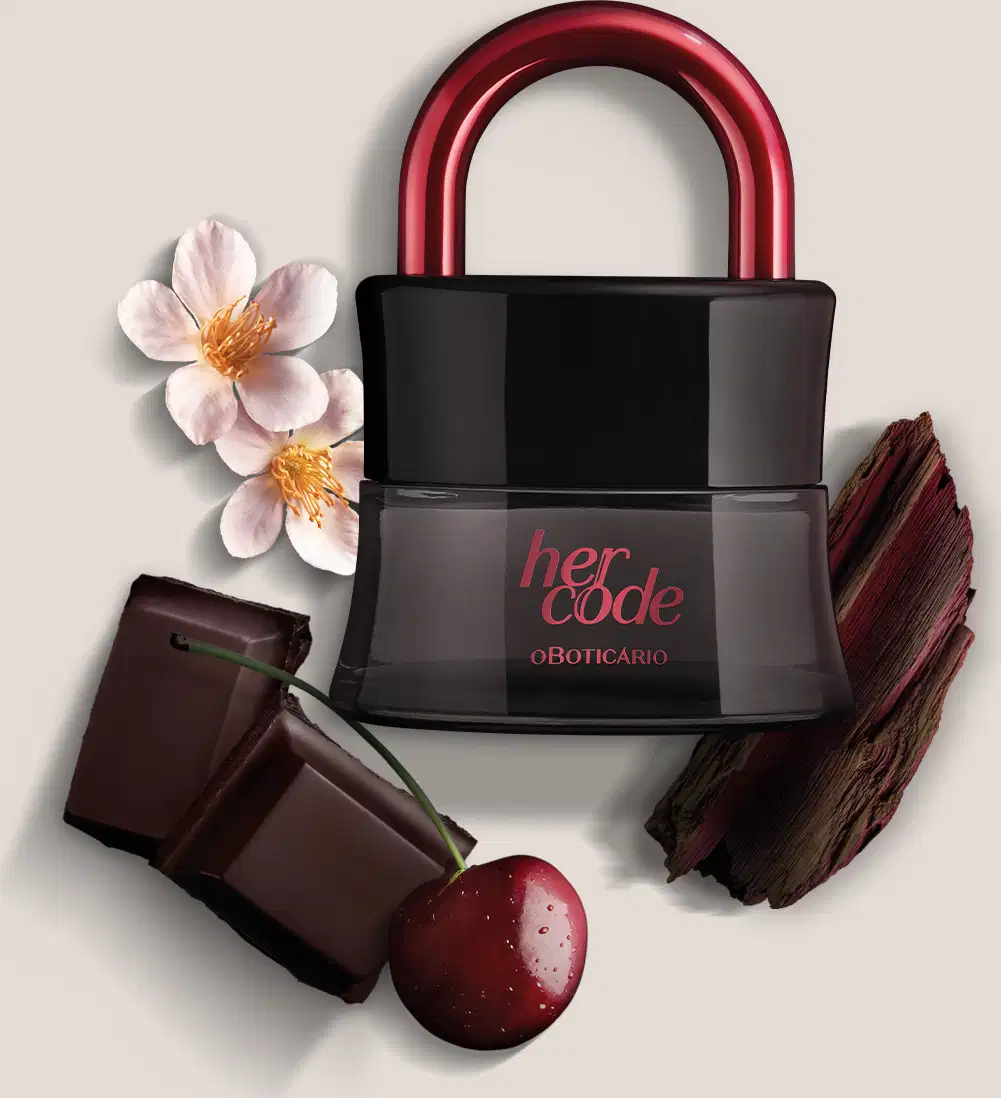 Imagem de um vidro preto com arco rosa metalizado de Eau de Parfum Her Code Clímax, sobre superfície clara com flores, chocolate e madeira ao redor.