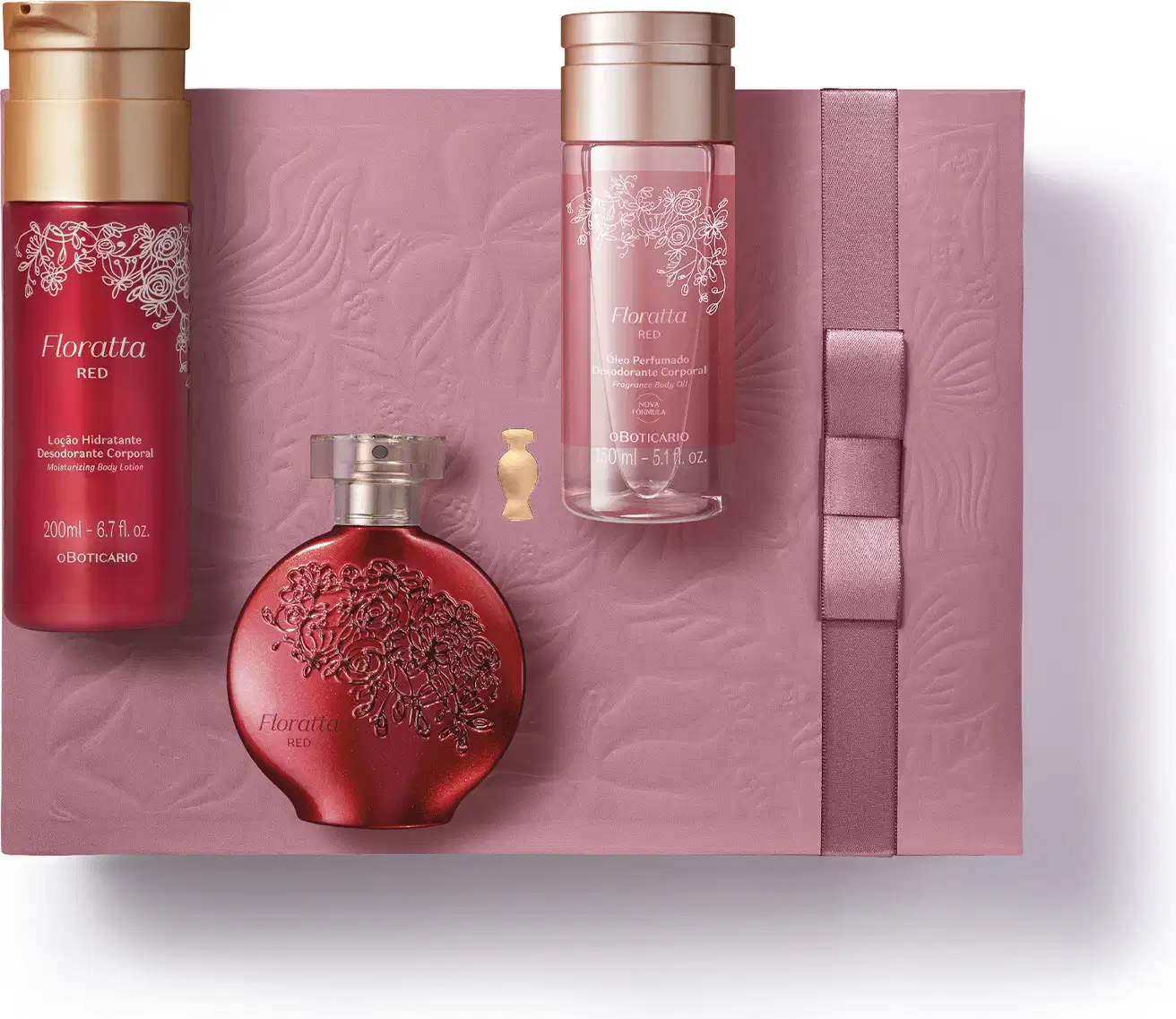 Caixa de presente rosa, nécessaire branco e três produtos da marca Floratta Red, sendo um frasco de óleo perfumado corporal, vidro de desodorante colônia e embalagem de loção hidratante corporal, todos em cor vermelha com detalhes dourados.