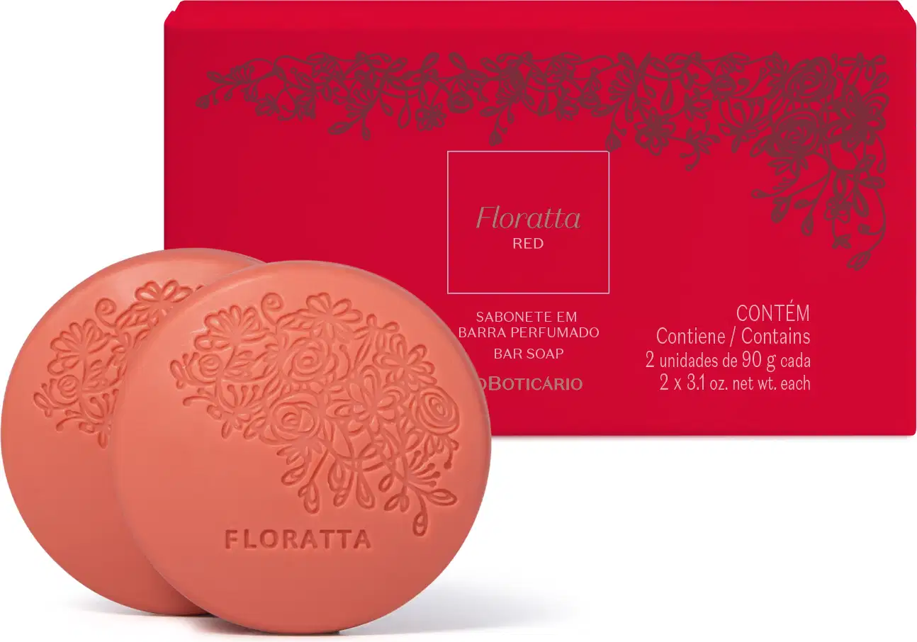 Imagem de dois sabonetes rosa Floratta Red com o nome da marca e florais gravados no produto, acompanhados de sua caixa na cor vermelha com florais vinho e letras amarelas.