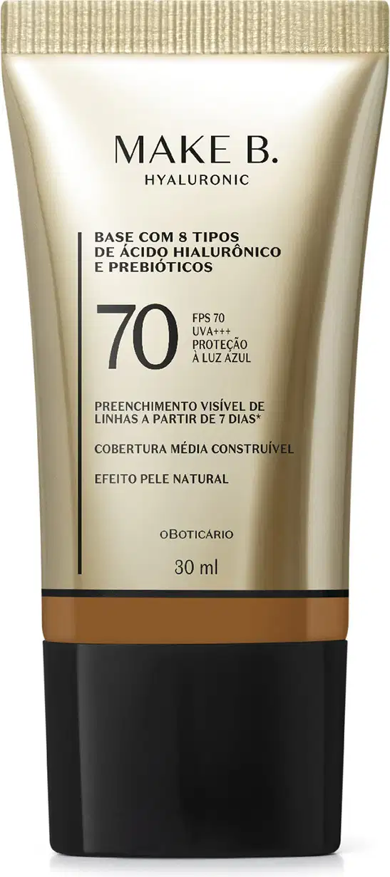 Frasco de base com 8 tipos de ácido hialurônico e probióticos da marca Make B., com FPS 70, UVA+++ e proteção à luz azul. Embalagem em tons de bege e preto, com informações sobre o produto.