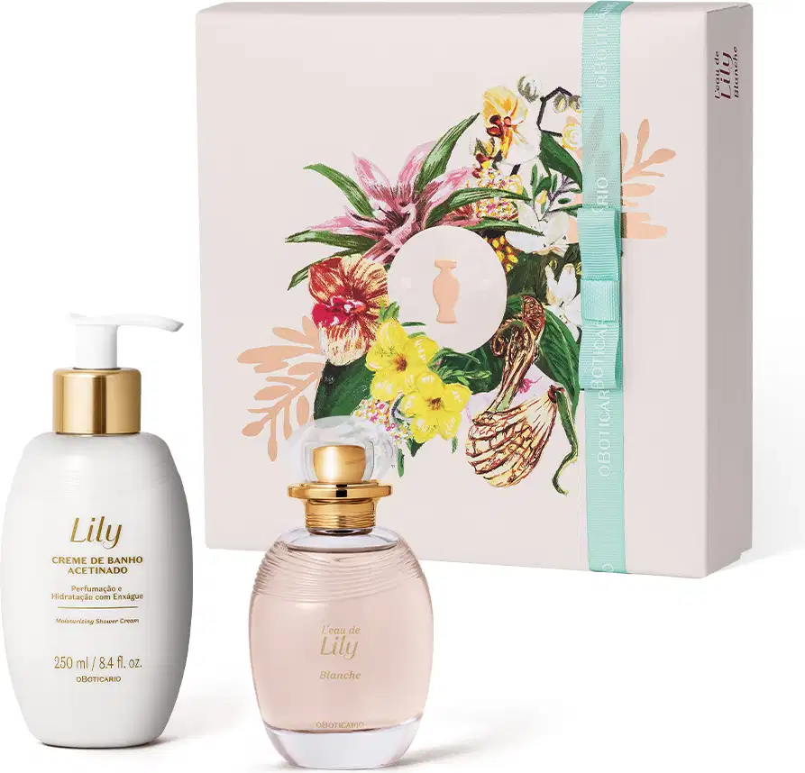 Imagem de uma caixa branca de presentes decorada com estampa floral, um vidro branco com bomba dosadora branca e dourada contendo creme de banho acetinado da marca Lily e o luxuoso desodorante colônia da mesma marca, em vidro transparente e tampa dourada.