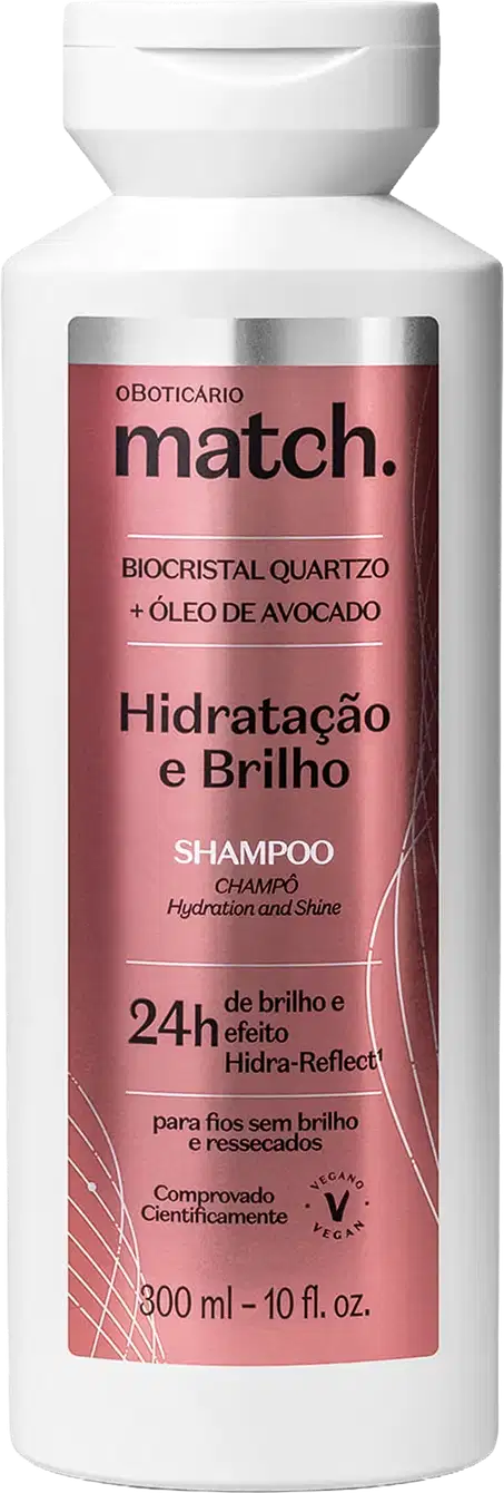 Frasco branco de shampoo da linha Match, com rótulo rosa destacando os ingredientes biocrystal quartz e óleo de abacate, para hidratação e brilho dos cabelos.