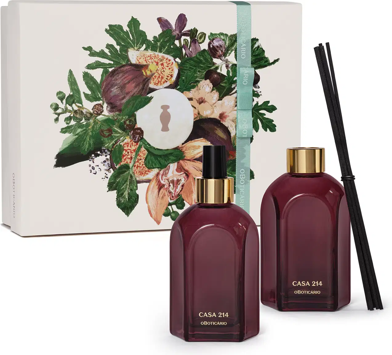 Caixa branca com ilustração floral e dois vidros retangulares na cor roxa, com rótulo em dourado. Um deles é o aromatizador de ambientes com válvula spray preta e o outro é um difusor com tampa dourada que acompanha varetas de madeira pretas.