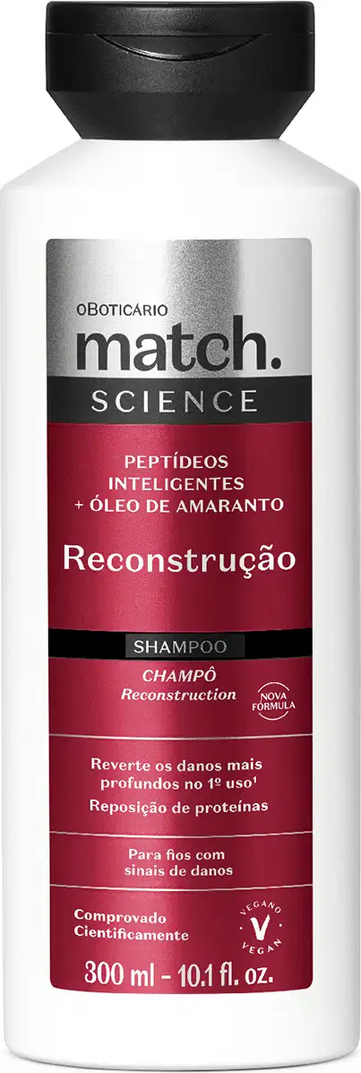 Frasco branco de shampoo da marca Match Science, com tampa preta e rótulo vermelho destacando "Reconstrução" e informações sobre peptídeos inteligentes e óleo de amaranto.