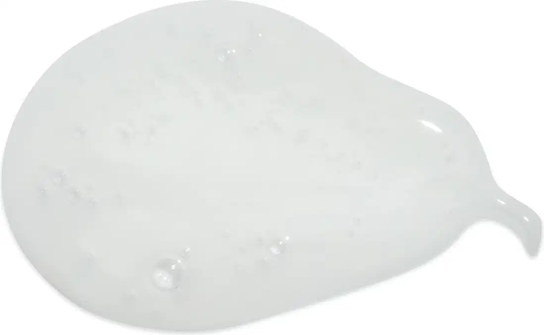 Textura suave e translúcida, com aspecto cremoso e brilhante. Apresenta uma consistência viscosa e úmida, com pequenas bolhas dispersas pela superfície.