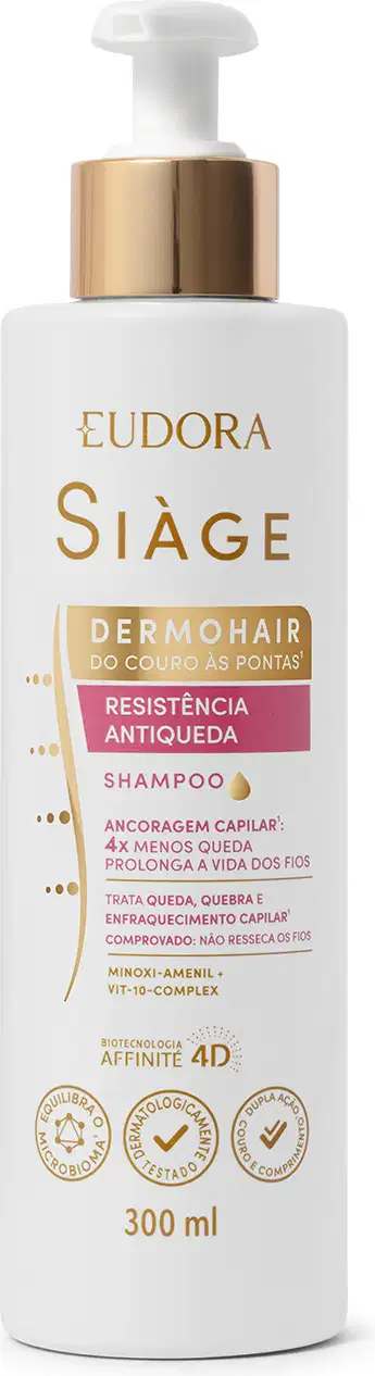 Frasco branco de shampoo da linha Siàge da Eudora, com tampa tipo pump com detalhes dourados e rótulo em doutra e rosa contendo informações sobre o produto, que promove resistência antiqueda e ancoragem capilar.