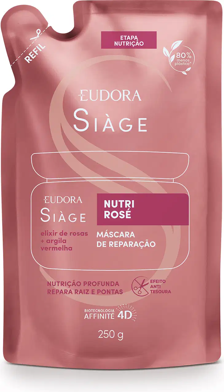 Embalagem flexível como um pacote de plástico rosé com detalhes em vermelho claro e branco e indicação de lugar para cortar com tesoura. No centro, um desenho da silhueta do pote original contém as informações do rótulo do refil em letras brancas.