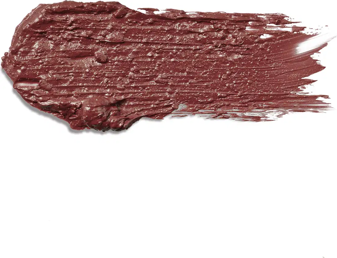 textura do batom nude nobre. tom marrom claro avermelhado suave e textura robusta e cremosa espalhada por uma superfície branca.