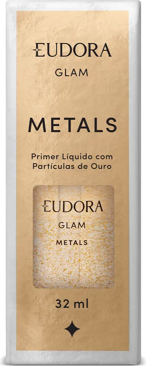 Embalagem retangular de papelão kraft com detalhes impressos em preto. Frasco de vidro transparente com o produto dourado visível através da embalagem. Rótulo com o nome Eudora Glam Metals e informações como Primer Líquido com Partículas de Ouro e 32ml.