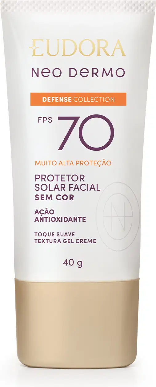 O produto apresentado é um protetor solar facial da linha Neo Dermo da marca Eudora, com FPS 70 e alta proteção. A embalagem é um tubo de cor bege, com rótulo branco e detalhes em roxo.