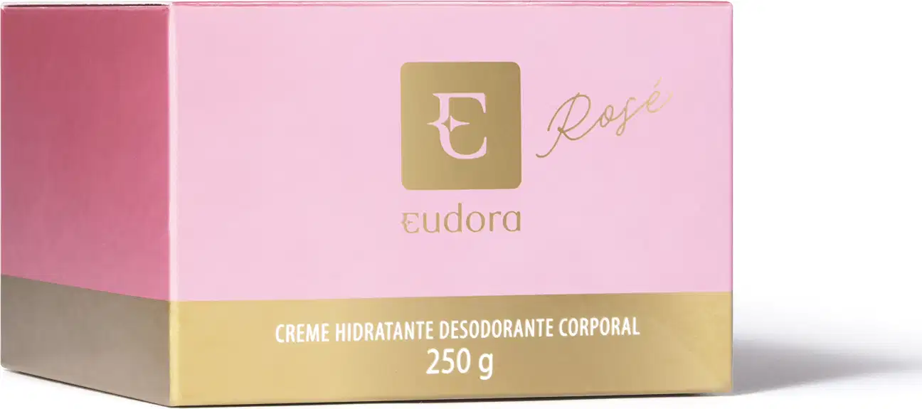 A imagem mostra a caixa do creme hidratante desodorante corporal Eudora Rosé. A embalagem é retangular nas cores rosa e dourado. A caixa exibe o logotipo da Eudora em dourado, bem como o nome do produto e seu peso líquido de 250g.