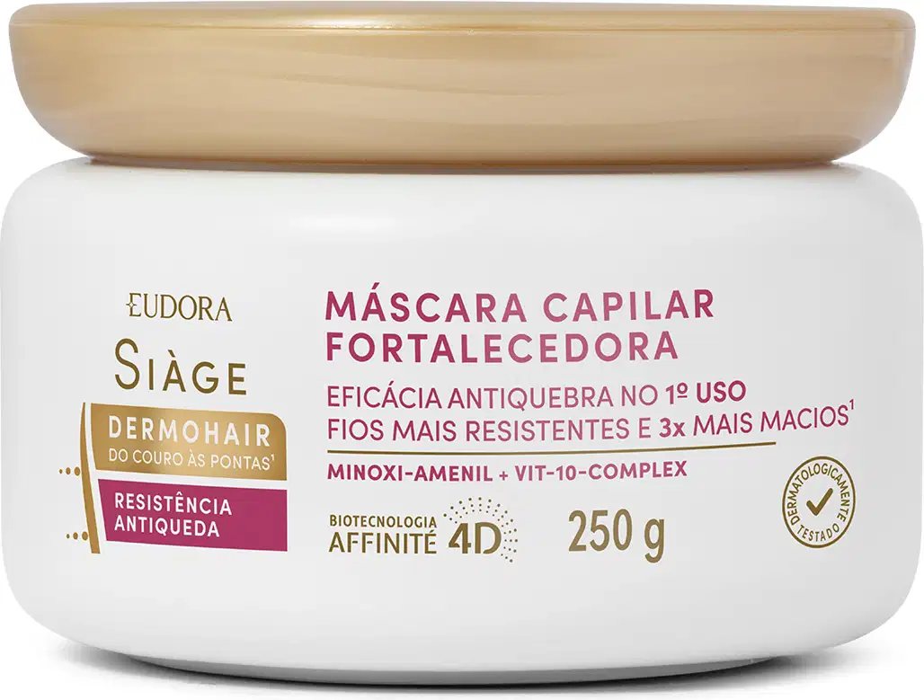 Trata-se de uma máscara capilar fortalecedora em embalagem branca opaca com tampa bege. A embalagem tem formato cilíndrico e contém 250g do produto. Destaca que promete eficácia antiquebra, deixando os fios mais resistentes e 3x mais macios.