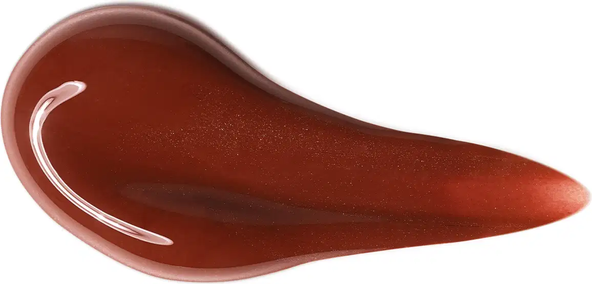 Textura do gloss em marrom cremoso intenso e brilhante.