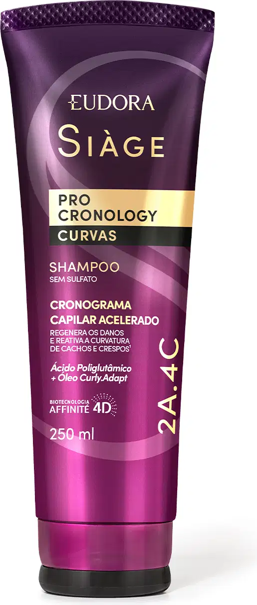 O produto apresentado é um Shampoo da linha Siàge Pro Cronology Curvas. A embalagem é um tubo de plástico de cor roxa com detalhes em dourado. O rótulo indica que conta com a tecnologia "Affinity 4D" e promete um cronograma capilar acelerado.