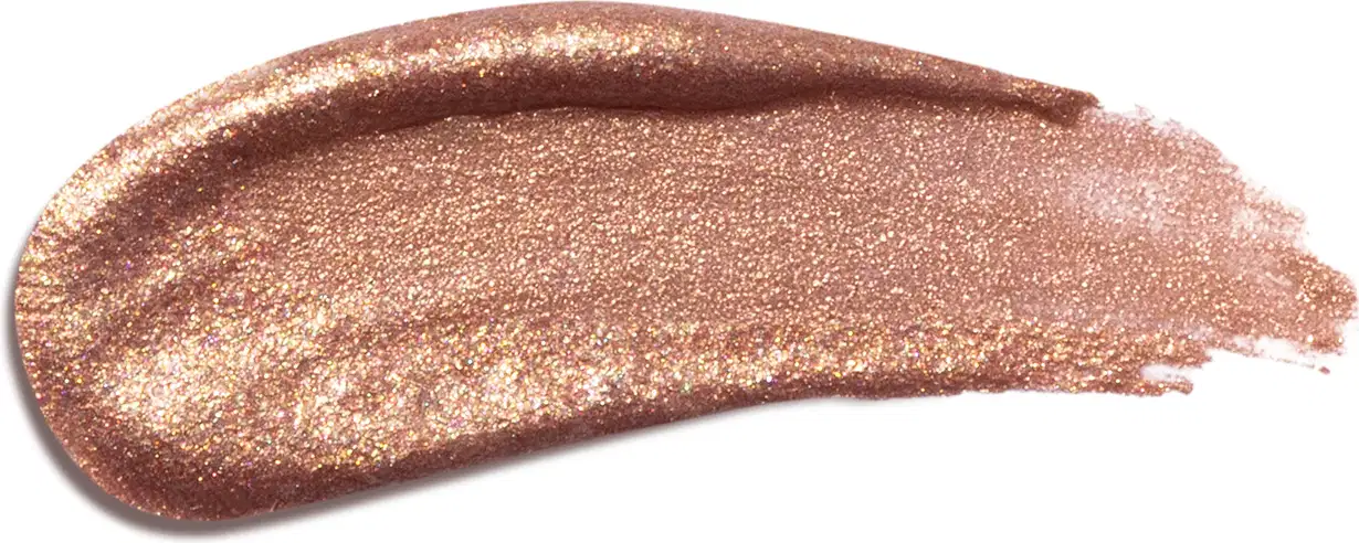 Textura do produto Iluminador Líquido da linha Niina Secrets. Com tonalidade bronze, com partículas de brilho.