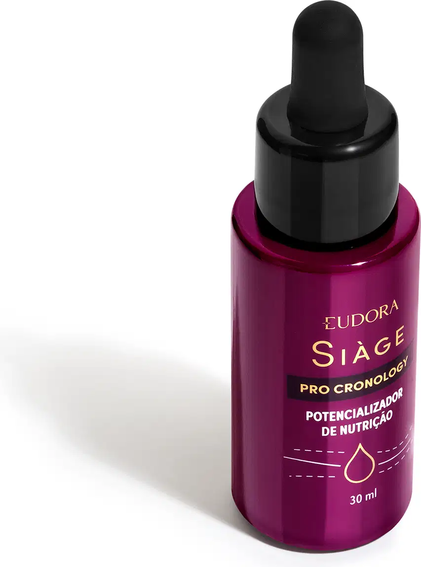 O produto apresentado é um frasco da linha Siàge Pro Cronology. Possui um formato cilíndrico com um conta-gotas preto na parte superior. A embalagem é predominantemente na cor roxa, com a descrição "Potencializador de Nutrição" impressos.