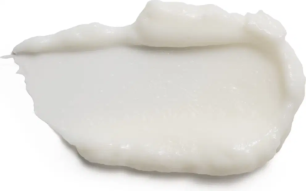 Textura cremosa e sedosa, com aparência suave e brilhante, típica de produtos Siàge. Cor branca leitosa, transmitindo sensação de maciez e hidratação.