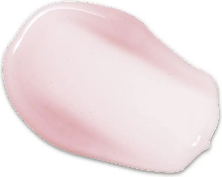 Textura de produto de maquiagem com aspecto cremoso, brilhante e translúcido em tom rosado claro.
