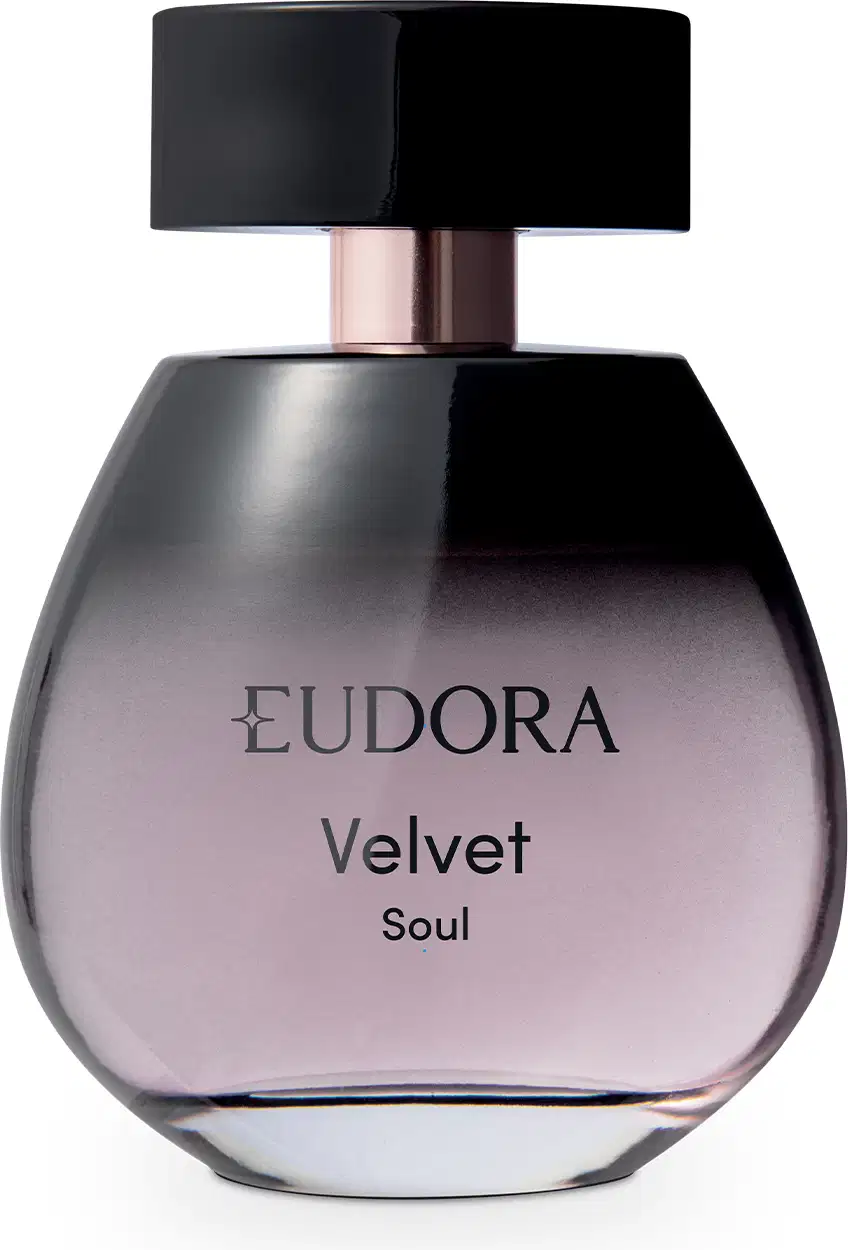 Frasco de item de perfumaria preto e arroxeado com tampa preta. Rótulo com o nome da marca "EUDORA" e o nome da linha "Velvet Soul" em letras pretas.