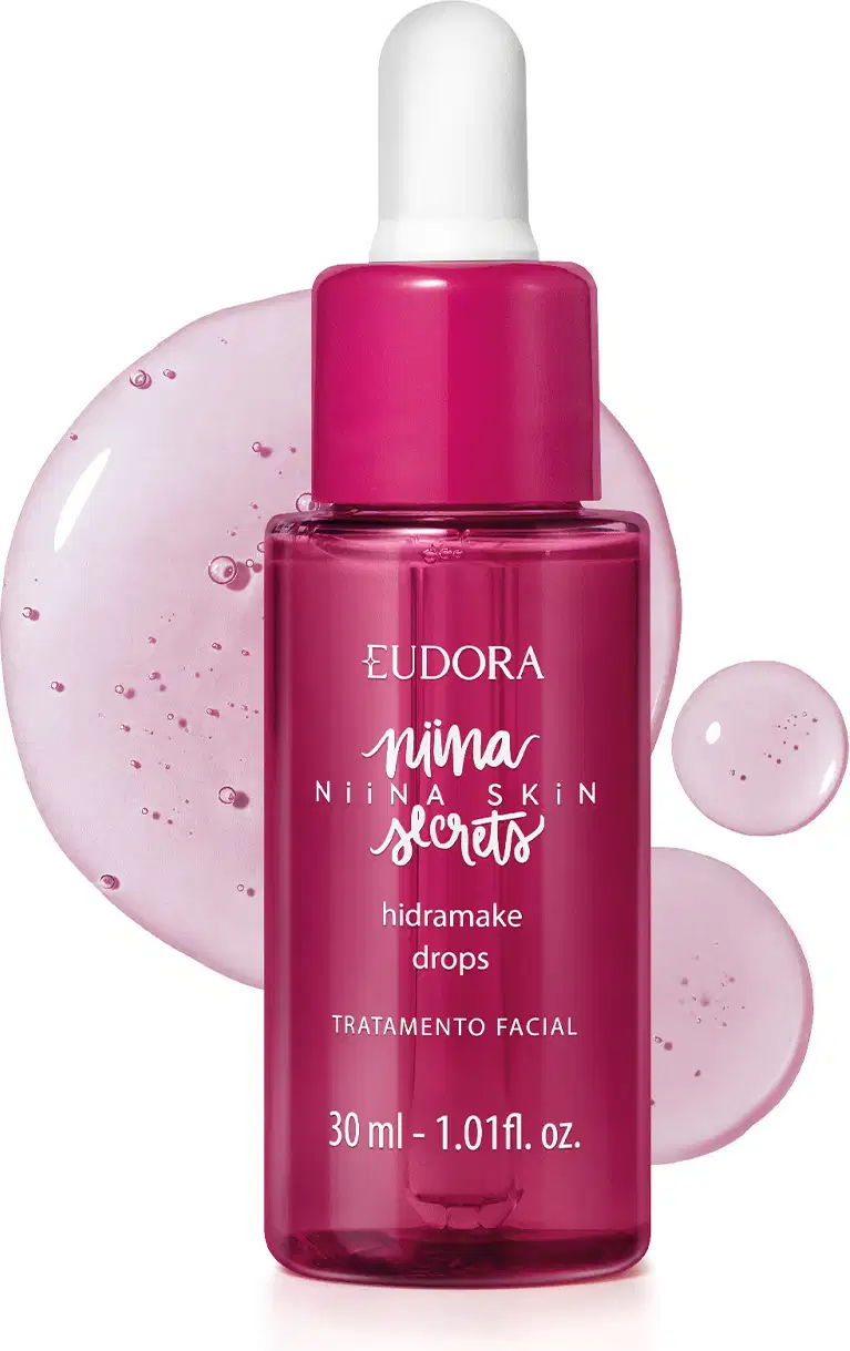 Frasco rosa com gotejador branco contendo sérum Eudora Niina Skin Secrets Hidramake Drops, 30ml, com gotas de textura líquida translúcida e brilhante ao fundo.