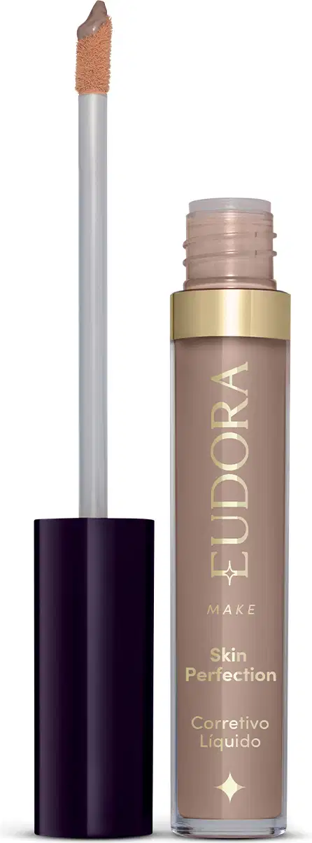Produto de maquiagem da marca Eudora, com embalagem em tons de bege e dourado. Trata-se de um corretivo líquido para a pele, o produto está aberto e mostrando como é o aplicador.
