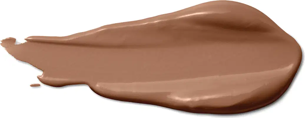 A textura do produto corretivo líquido apresenta uma aparência cremosa e suave, com uma tonalidade marrom clara e uniforme. 