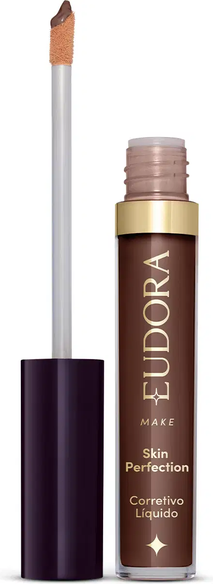 Produto de maquiagem da marca Eudora, com embalagem em tons de marrom e dourado. Trata-se de um corretivo líquido para a pele, o produto está aberto e mostrando como é o aplicador.
