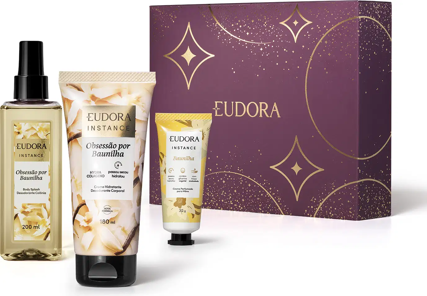 Conjunto de produtos de beleza da marca Eudora, incluindo um body spray, um creme hidratante e um creme para mãos de Instance Obsessão por Baunilha. Com a caixa decorativa com elementos dourados e roxos, indicando ser um kit presente de dia dos namorados.