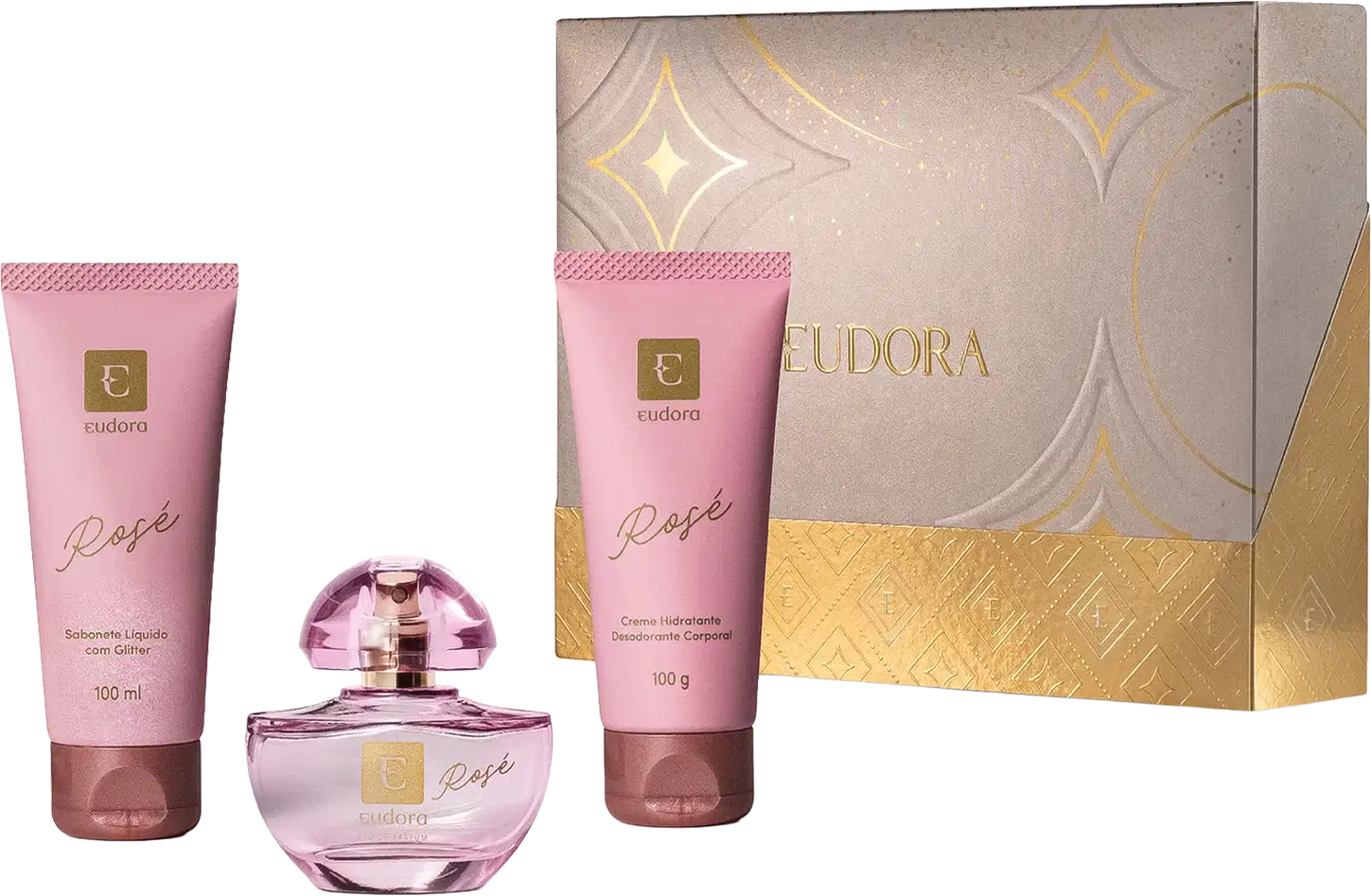 Kit Eudora Rosé contém sabonete líquido com glitter (100ml), perfume em frasco de vidro rosa, creme hidratante desodorante corporal (100g). Embalagem bege com detalhes dourados e padrão geométrico.