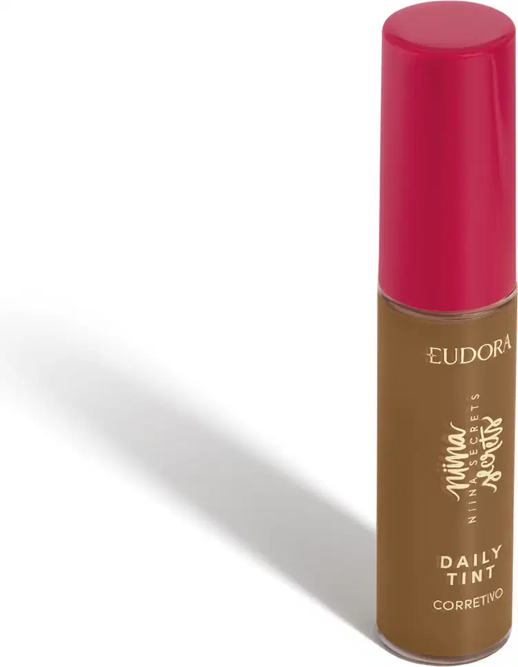 Corretivo líquido Eudora Niina Secrets Daily Tint em frasco cilíndrico com tampa rosa pink e corpo marrom. Produto de cobertura com fórmula corretiva para uso diário, apresentado em embalagem prática e funcional.