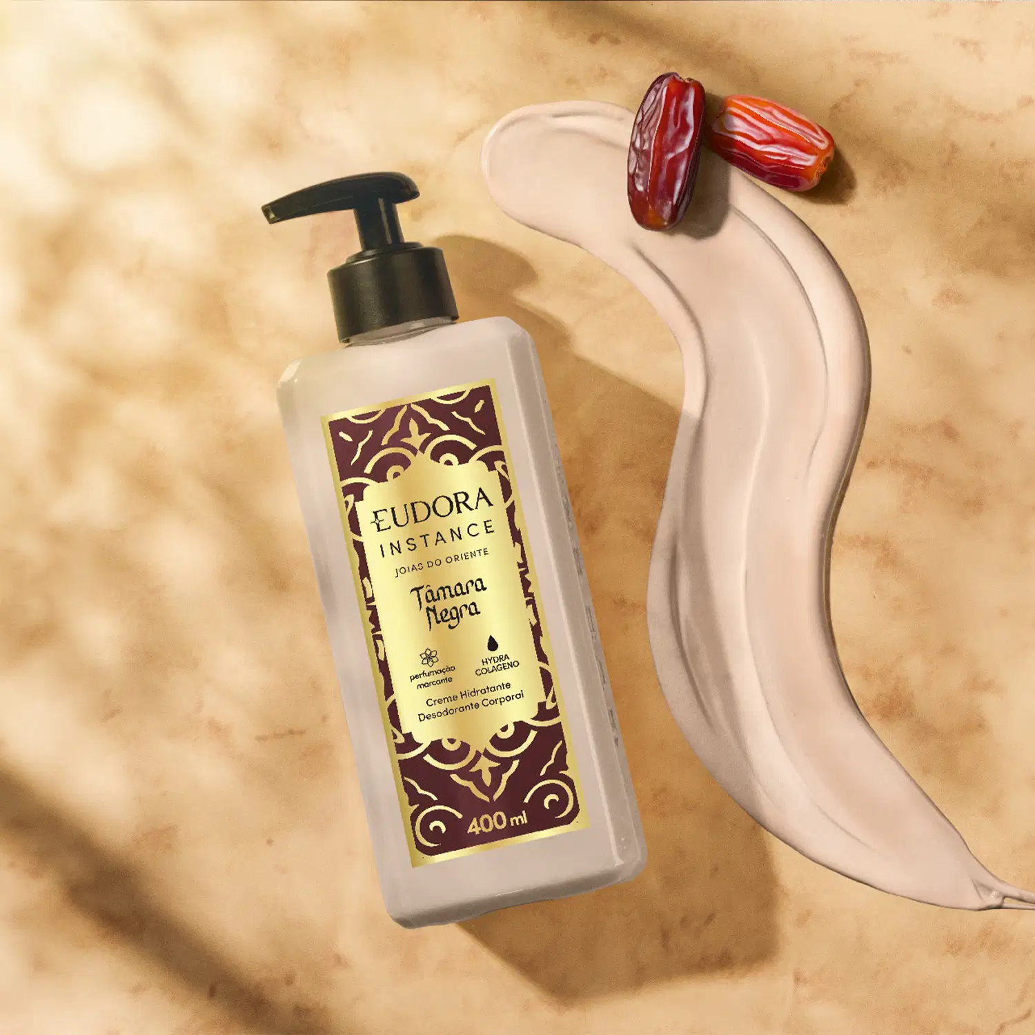 Creme hidratante desodorante corporal Eudora Instance Tâmara Negra, frasco de 400ml com bomba preta, embalagem bege com rótulo decorativo em tons marrom e dourado.