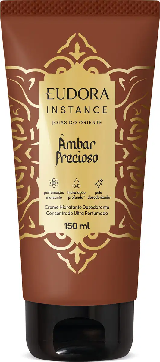 Frasco de creme hidratante desodorante concentrado ultra perfumado da marca Eudora Instance, com embalagem marrom e dourada, rótulo com texto "Âmbar Precioso" e desenhos ornamentais decorativos.