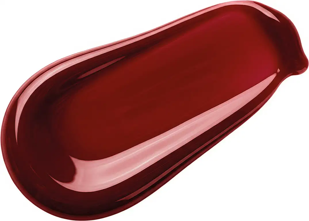 Imagem da textura do produto: Superfície brilhante e textura lisa em tom vermelho cereja. Formato alongado e curvo.
