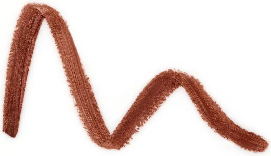 Textura na cor canela, com aparência levemente cremosa e brilhante, em superfície lisa e uniforme, sugerindo um produto de maquiagem.