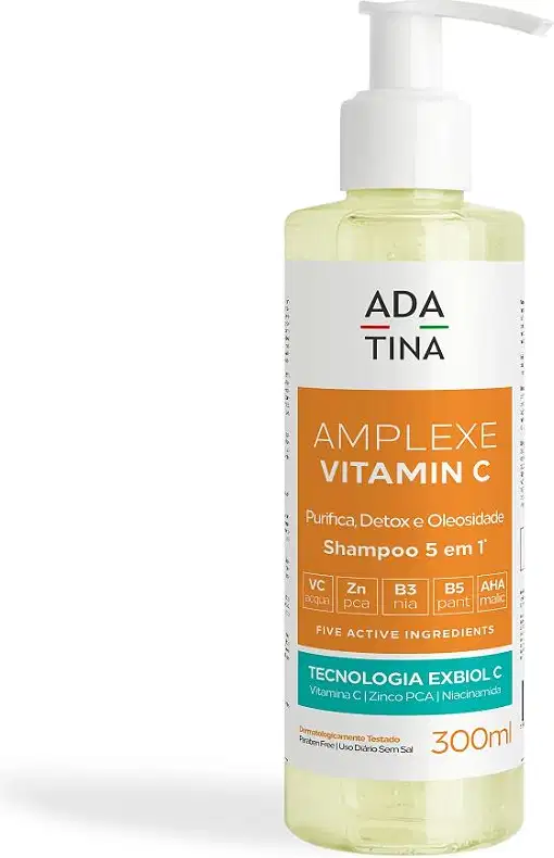 Frasco de shampoo da marca Adatina, com 300ml de volume, na cor amarelo claro. O rótulo apresenta o nome "Amplexe Vitamin C" e destaca os ingredientes ativos, como vitamina C, zinco e niacinamida.