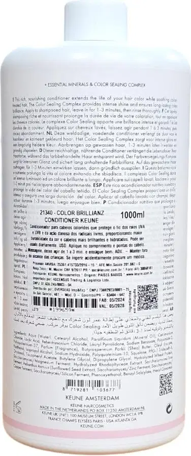 Frasco branco de condicionador Keune Color Brillianz de 1000ml, com rótulo detalhado em várias línguas descrevendo os benefícios do produto para cabelos coloridos.
