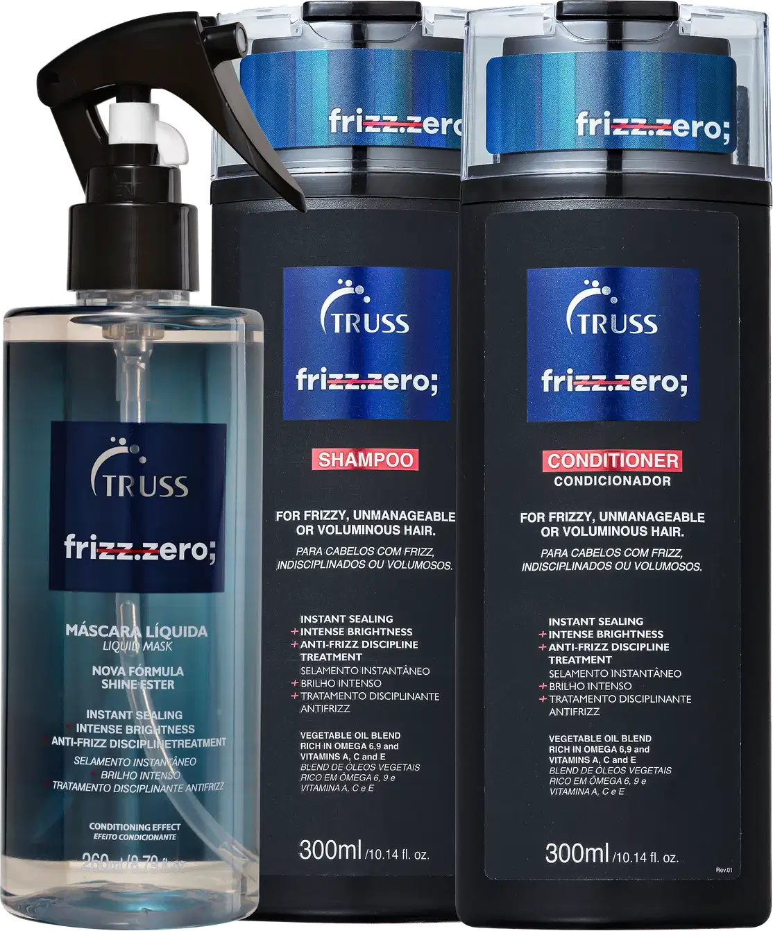 A imagem mostra uma linha de produtos de cabelo da marca Truss chamada "Frizz Zero". Há um frasco spray de máscara líquida, um pote de shampoo e um de condicionador. Todos os produtos têm uma aparência sofisticada em tons de azul e preto.