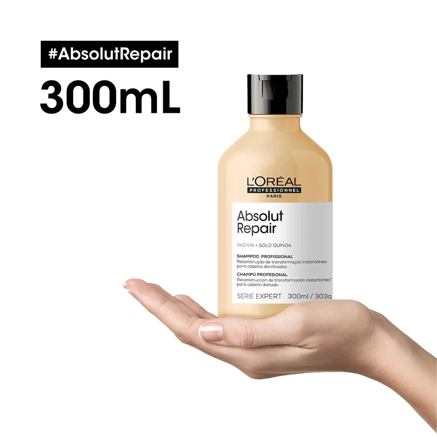 Frasco de 300 ml de shampoo profissional da marca L'Oreal Professionnel, da linha Absolut Repair, com rótulo branco e amarelo, contendo informações sobre os ingredientes e benefícios do produto.
