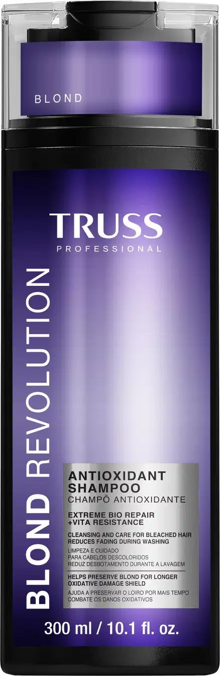 Imagem mostra o frasco retangular roxo do shampoo Truss Blond Revolution.