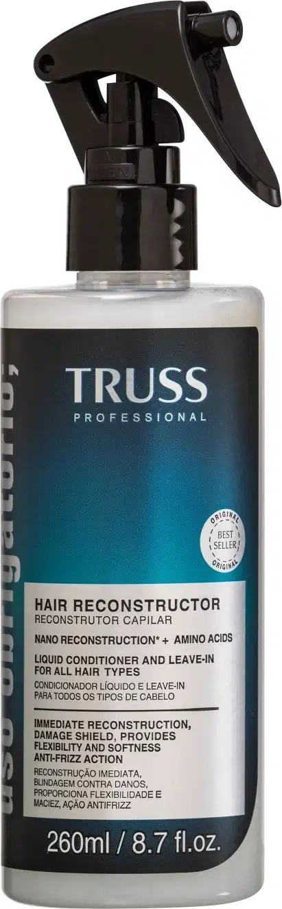 Produto de reconstrução capilar TRUSS Professional. Frasco plástico transparente com spray acionado por gatilho preto. Rótulo azul e preto com texto descrevendo o produto como "Hair Reconstructor" (Reconstrutor Capilar).